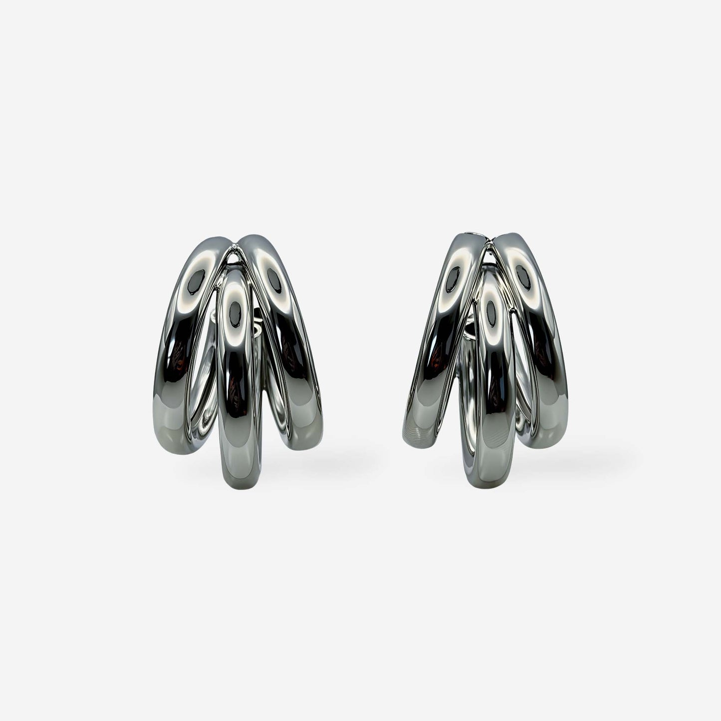 Aretes efecto triple aro elaborados en cobre con baño de rodio