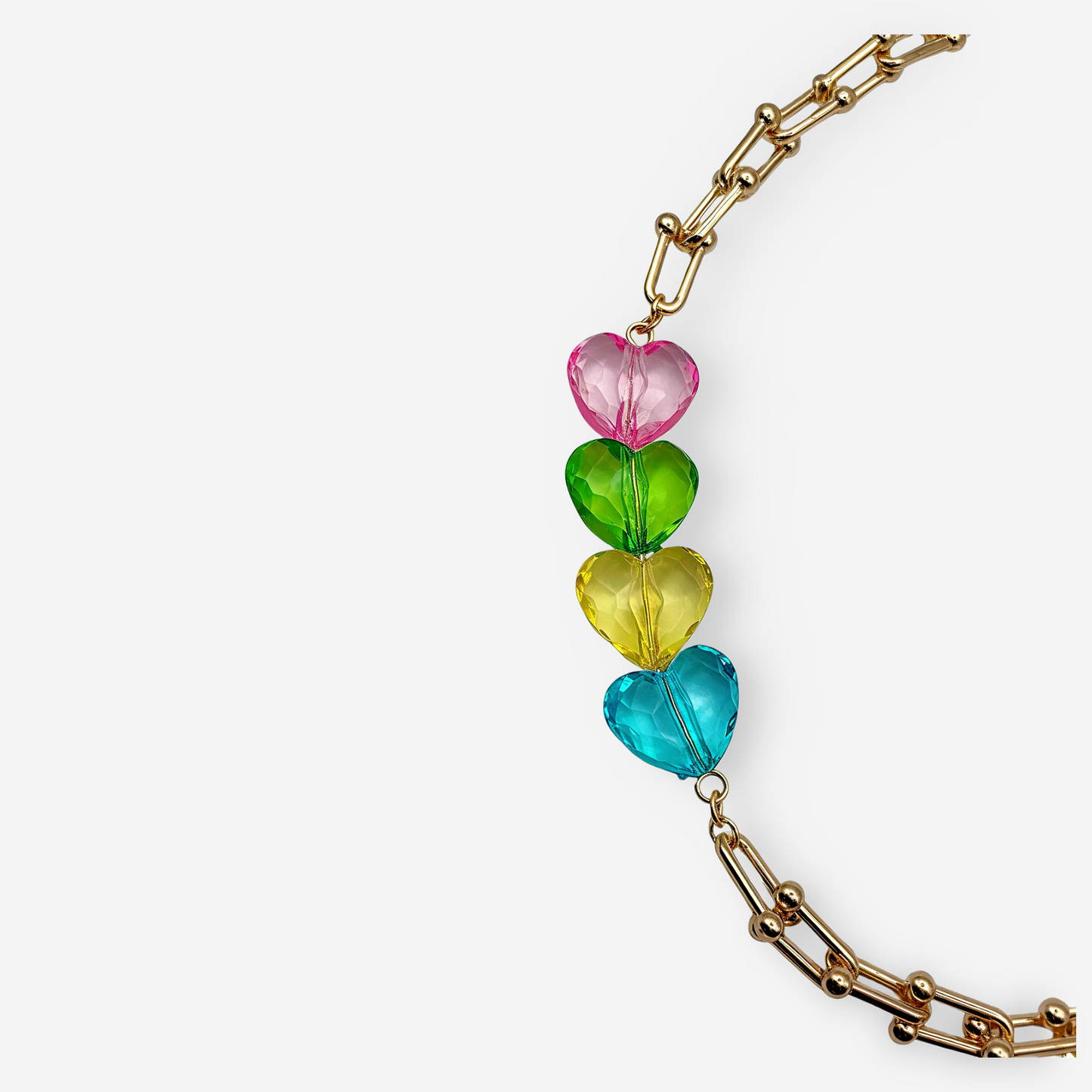 Collar Candy Hearts Pastel con dijes de corazones en resina rosa verde amarillo y turquesa sobre cadena paper clip dorada oro 18k