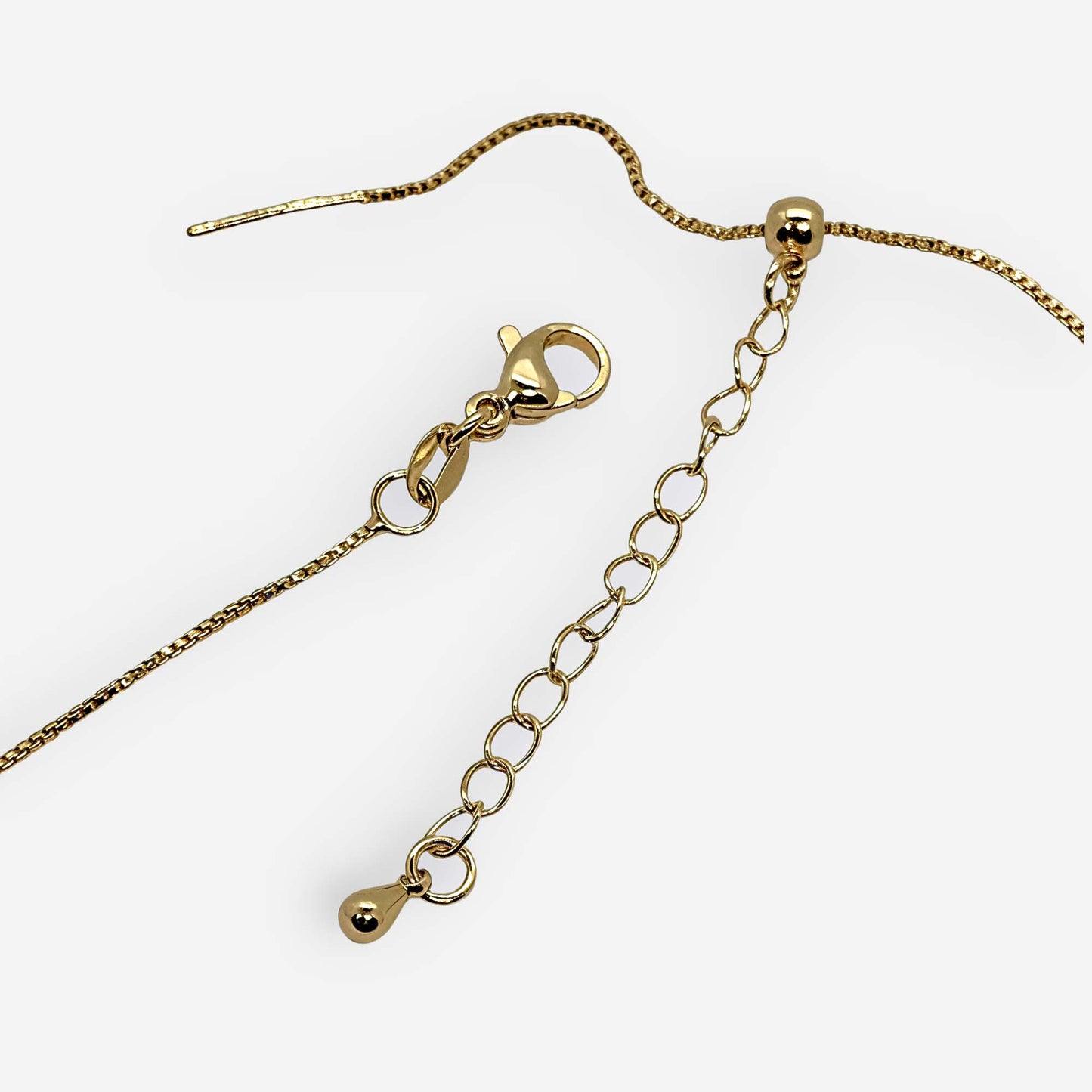 broche pico loro con cadena extensible