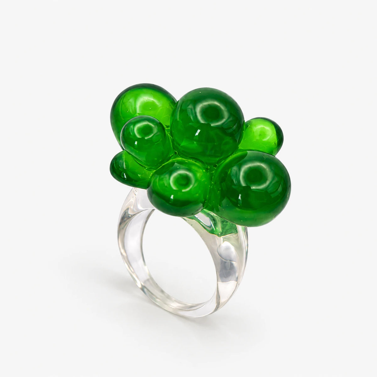 Anillo Bubble Flower verde de resina con diseño floral de formas redondeadas y acabado brillante.