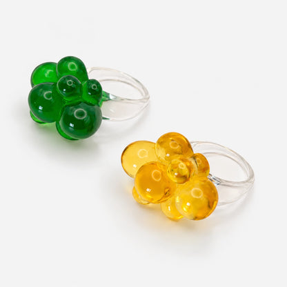 Anillos Bubble Flower de resina en colores con diseño de flor translúcida