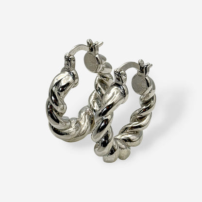Aretes plateados gruesos tipo hoop twist