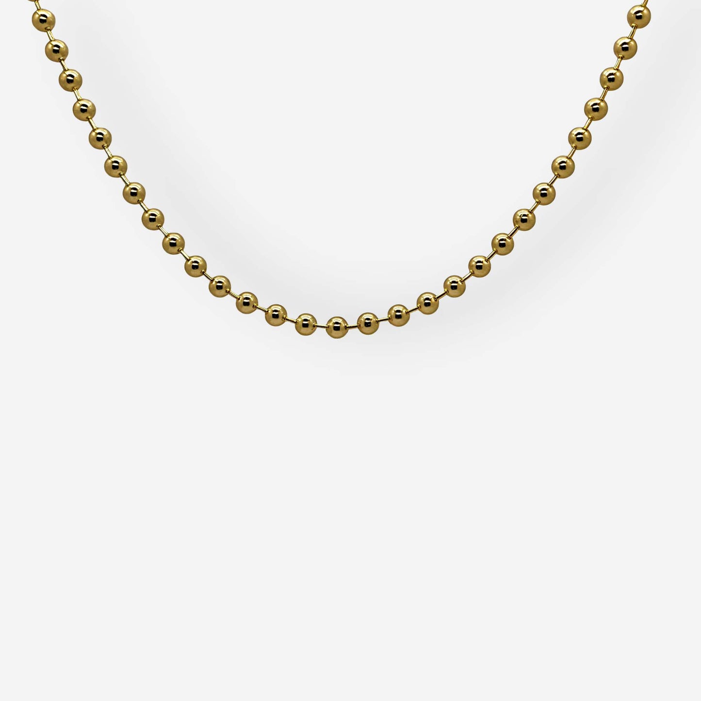 Collar dorado delicado de balines