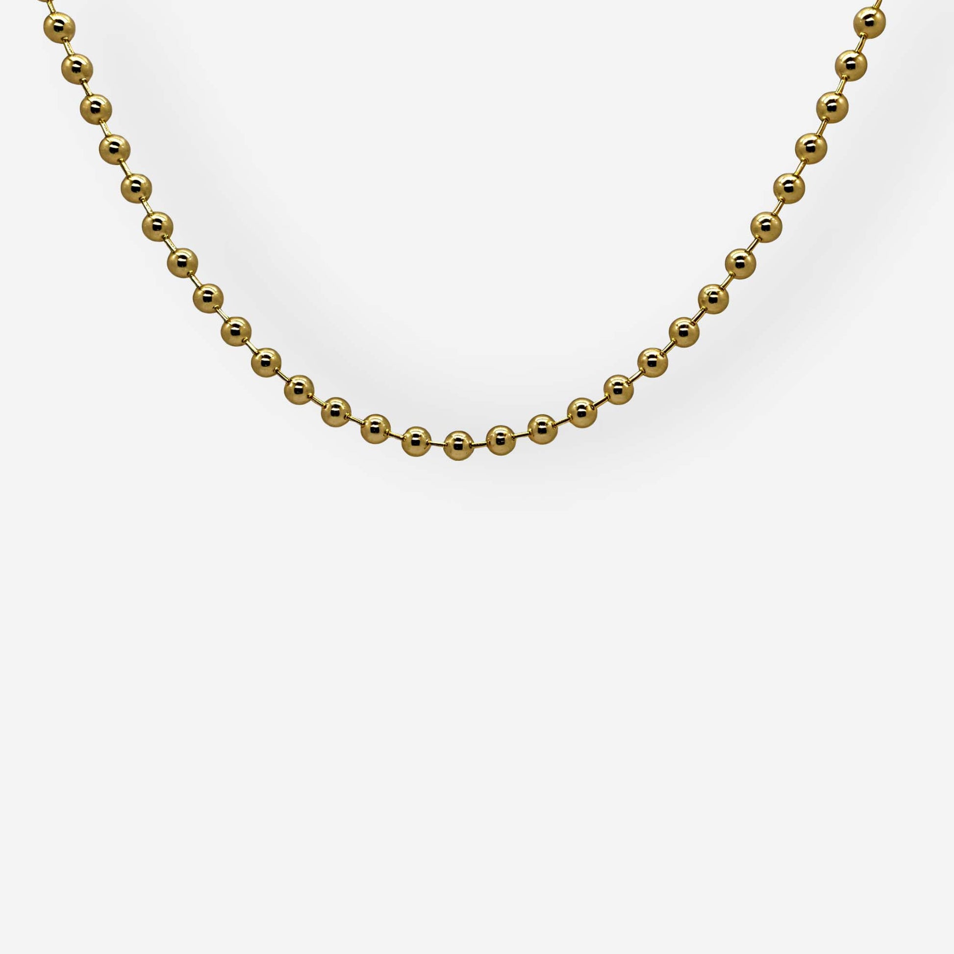 Collar dorado delicado de balines