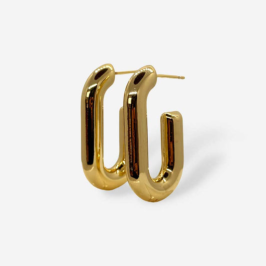Aretes dorados con forma de U y acabado brillante
