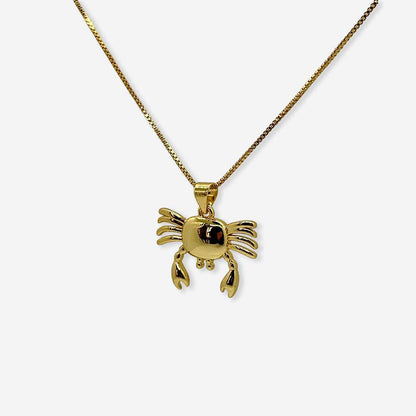 Collar con dije de cangrejo en oro 18K estilo playero