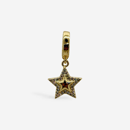 Charm en forma de estrella dorada con brillo y broche intercambiable